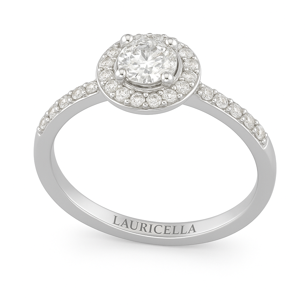 Immagine anello con diamante centrale taglio brillante e corona di piccoli brillanti intorno e sulle spalle del gambo. 